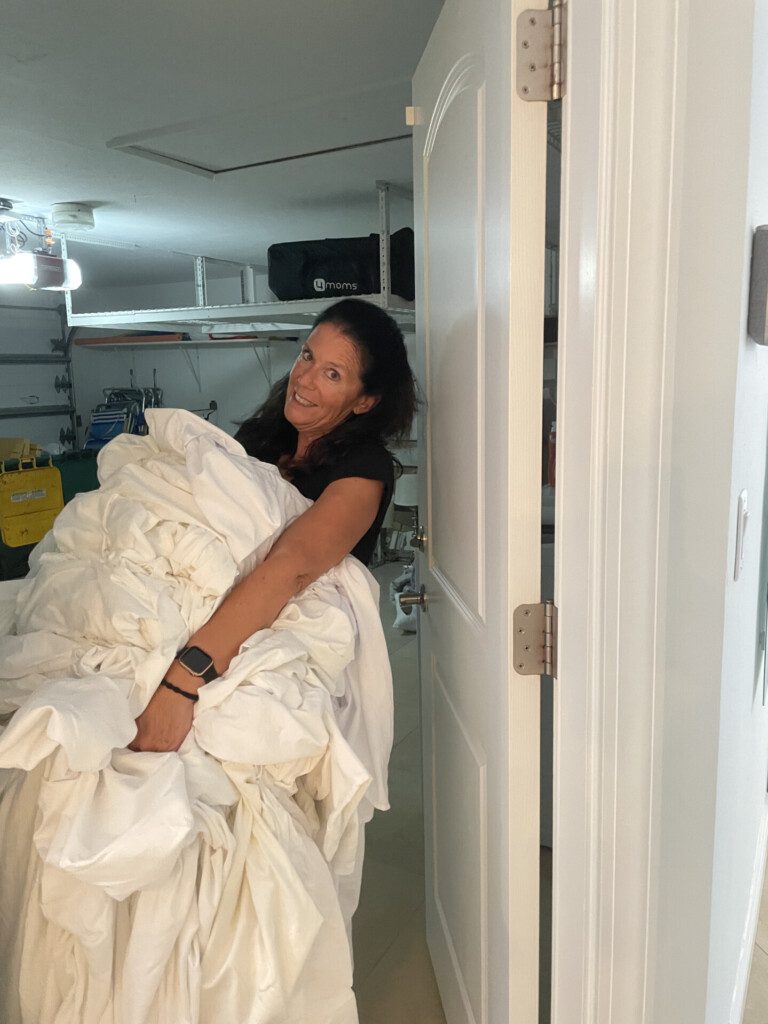Debbie Beginning to Quality Check Linens scaled.jpg