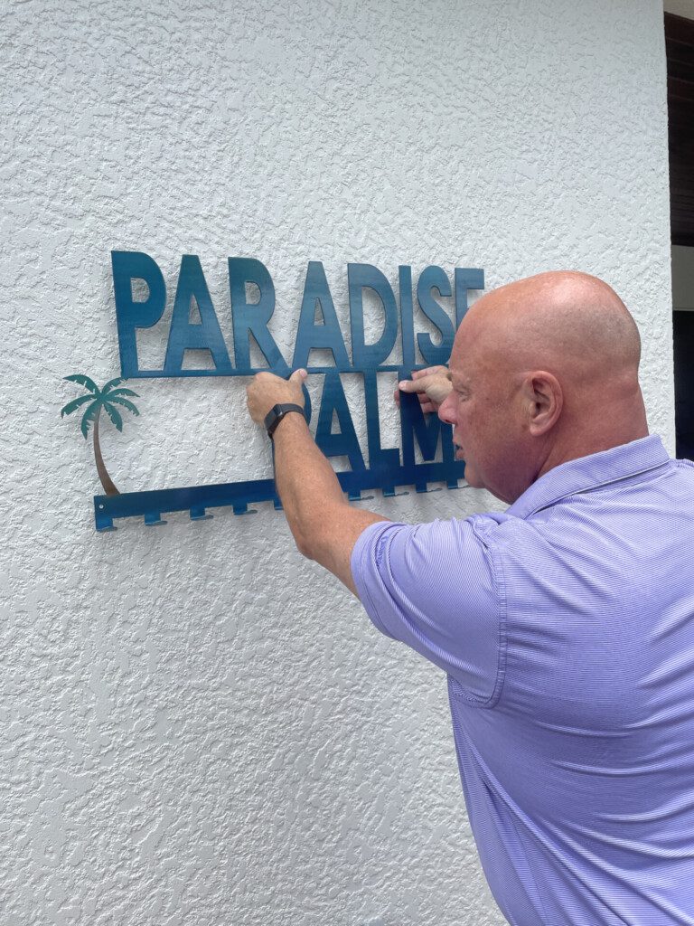 Steve Hanging Property Sign scaled.jpg